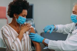 What To Expect From Potential Vaccine Booster Side Effects