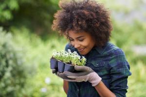 Woman smelling Spring flowers