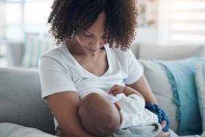 Woman breastfeeding an infant