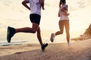 People running at sunset