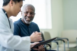 Summit Health oncologist discussing radiation therapy with a patient